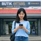 Panduan aman membeli emas Antam di era media sosial agar terhindar dari penipuan dengan memastikan sumber informasi dan proses transaksi resmi. Foto PT Antam
